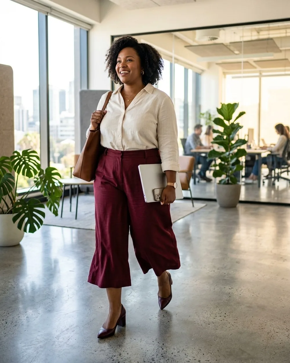 Burgundy Culottes with a Tucked-In Cream Blouse - 17 Feminine Plus-Size Business Casual Outfits That Still Feel Professional